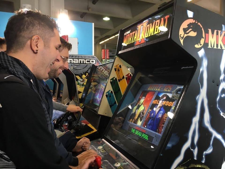 Lorenzo and Roberto playing arcade games together